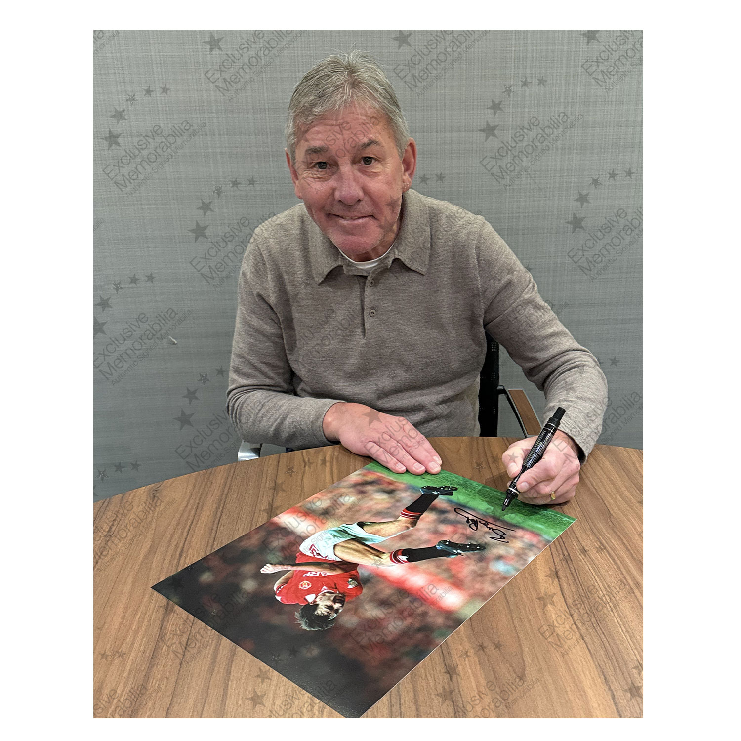 Bryan Robson Signed Manchester United Football Photo: Captain Marvel. Framed