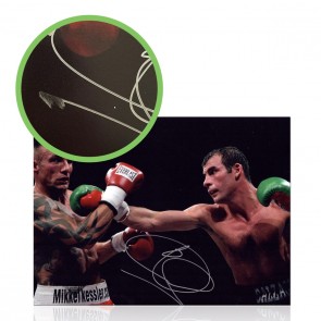 Joe Calzaghe Signed Boxing Photo: Fighting Mikkel Kessler. Damaged A