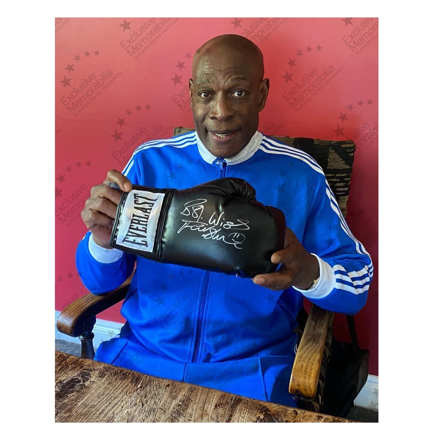 Frank Bruno Signed Black Boxing Glove. Display Case With Plaque