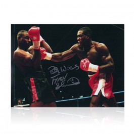 Frank Bruno Signed Boxing Photo: Fighting Oliver McCall