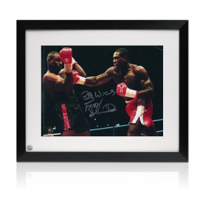 Frank Bruno Signed Boxing Photo: Fighting Oliver McCall. Framed