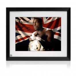 Frank Bruno Signed Boxing Photo: The WBC World Heavyweight Champion. Framed