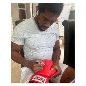 Anthony Joshua Signed Red Boxing Glove. Damaged C