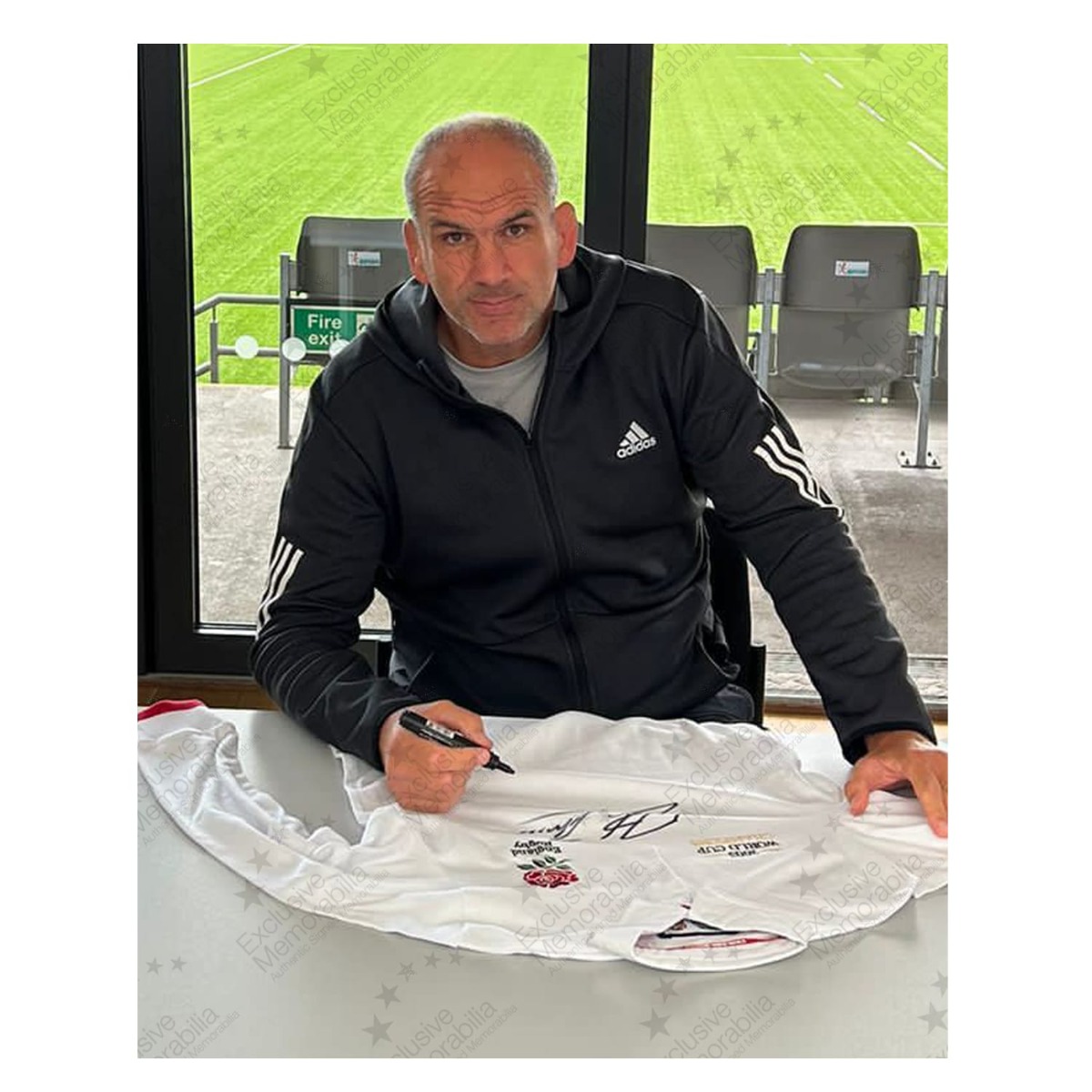 Martin Johnson Signed England Rugby Shirt: Champions Embroidery. Standard Frame