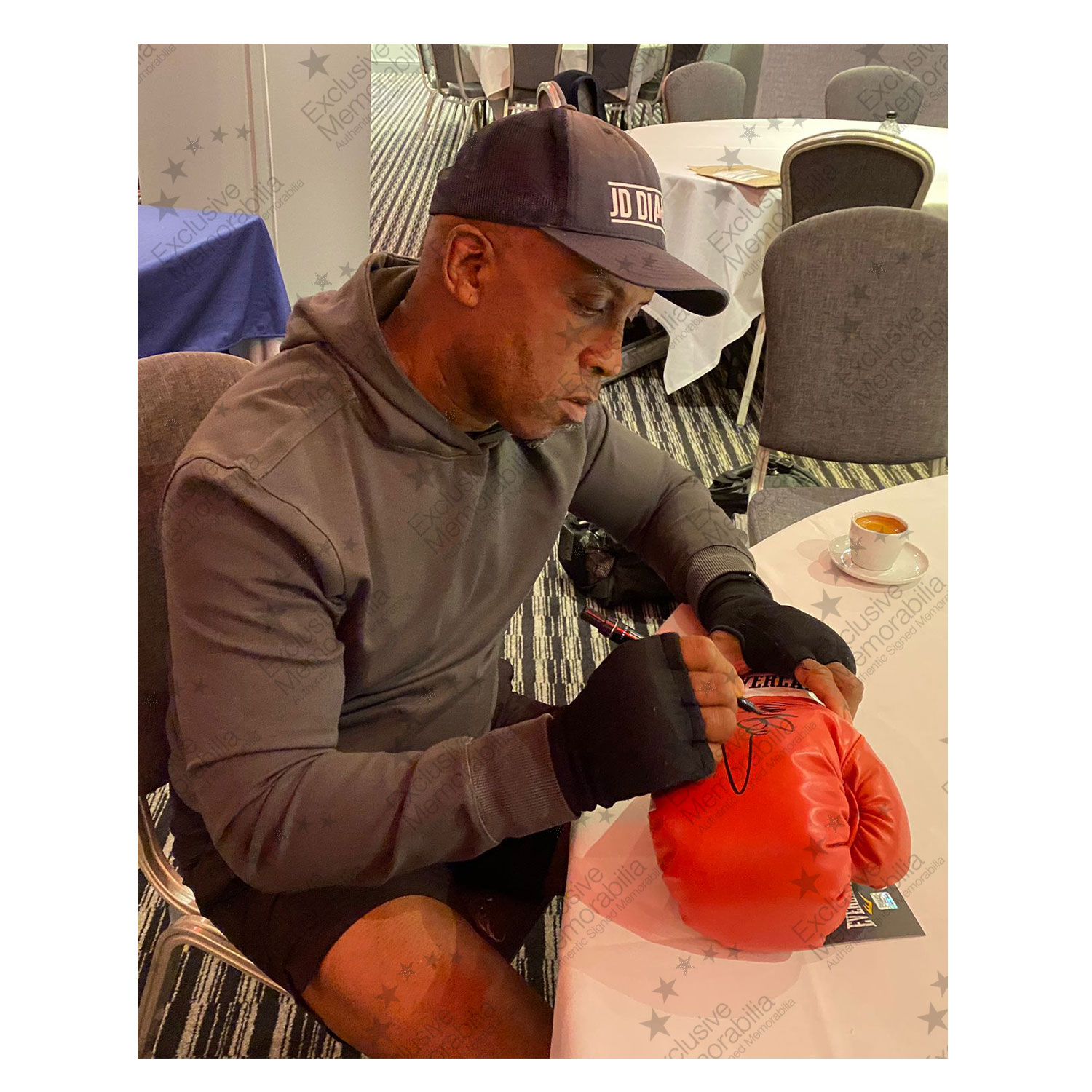 Nigel Benn Signed Red Boxing Glove. Display Case